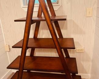 A shaped shelving unit