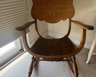 Antique Quartersawn Oak Spindle Back Rocking Chair with Carved Crest Rail