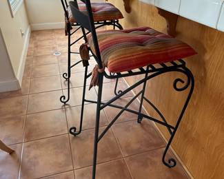 Pair of Wrought Iron Swirl Back Bar Stools with Striped Cushions