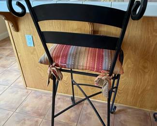 Pair of Wrought Iron Swirl Back Bar Stools with Striped Cushions