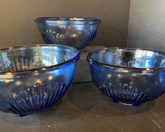Three blue nesting bowls