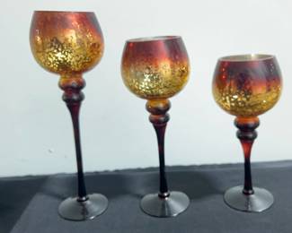 Three candle holders