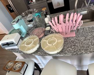 Many various kitchen items to include knife, set, Keurig towel dispenser, and more!