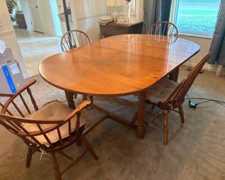 . . . beautiful dining table and chairs comes with two large leaves