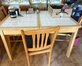 . . . kitchen tile table and chairs