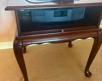 . . . Queen Anne-style table with Bose radio nestled inside