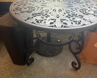 . . . brand-new wrought-iron table