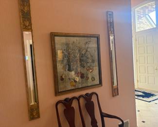 . . . great art piece flanked by accent mirrors