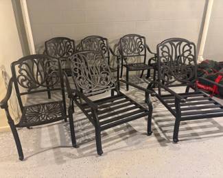 . . . brand new wrought-iron loungers and chairs