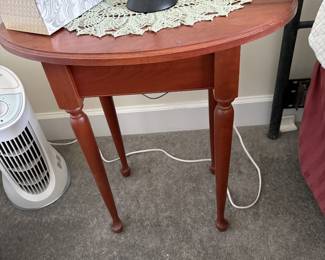 Pair of cherry oval bedside tables