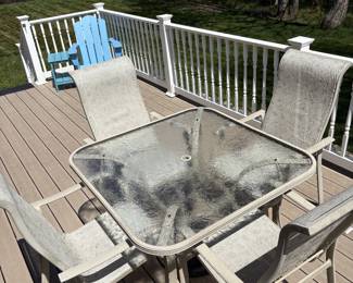 Patio set table 4 chairs, an umbrella