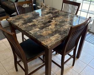 Counter height, dining set, faux marble top four slatted back chairs with cushion bottoms