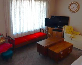 yellow chaise fainting couch, end tables, entertainment center, cedar chests, wall clocks, Panasonic TV, Samsung TV, Sony blu ray player