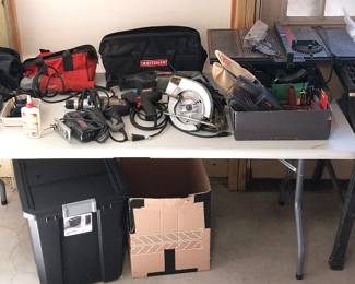 Craftsman table saws, Milwaukee grinder, belt sander, corded drills, circular saw, large Dremel, tool bags