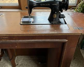 Singer 15 sewing machine and cabinet and other vintage sewing pieces.