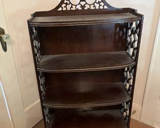 Chippendale-style display. Coordinating mirror also available