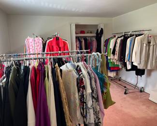Room filled with Ladies Clothing - Various Sizes