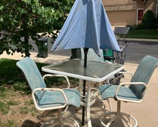 Patio table w 4 chairs and umbrella