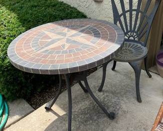Stone top table, cast iron & aluminum chair