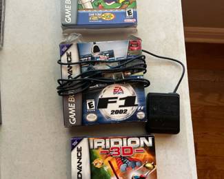 Gameboy Advance player, F1 2002 and games
