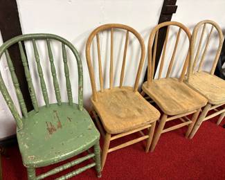 lots of vintage antique wooden chairs
