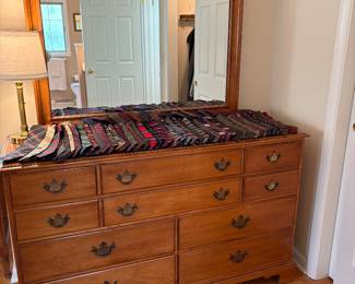 dressers and desks and lots of mens' ties