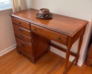 dressers and desks and lots of mens' ties