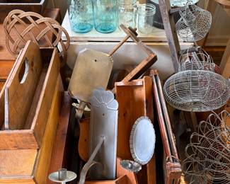 vintage metal candle sconces with reflectors and wire egg baskets