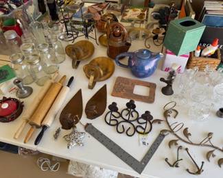 Old rolling pens, tea pots, metal wall art