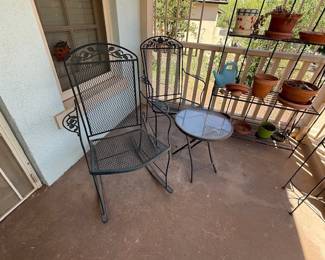 Metal rockers with small glass top table, metal plant shelf
