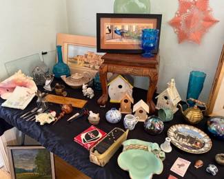 Small wood table, art, pottery, shell, blue glass, bird houses