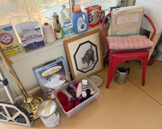 Red metal chair, chemicals, socks, rolling cart