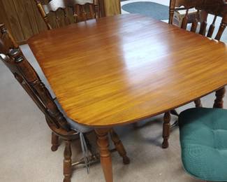 Dining table with four matching chairs