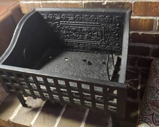 Vintage iron log/newspaper holder
