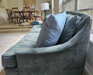 Gorgeous, classic, quality MCM blue sofa with exposed, wood tapered legs.  Some scratches on side and a few scuffs on the wood trim below from vacuum.  (L 90" x H 29" x D 31") $395