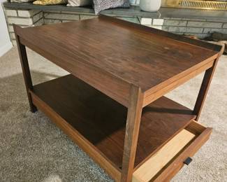 $125 This is a mid-century modern style walnut end table with a single drawer and lower shelf.