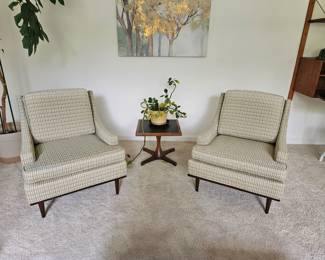 Classic MCM side chairs with wood trim bottom and tapered wooden legs.  Checked blue, green, yellow upholstery . Some light fading on backs some signs of wear but generally very good condition. $100 EACH. H 31" x W 27.5" x 30"