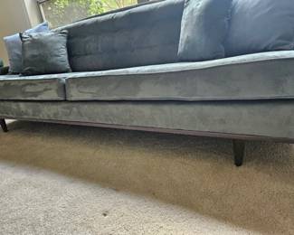 Gorgeous, classic, quality MCM blue sofa with exposed, wood tapered legs.  Some scratches on side and a few scuffs on the wood trim below from vacuum.  (L 90" x H 29" x D 31") $395