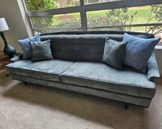 Gorgeous, classic, quality MCM blue sofa with exposed, wood tapered legs.  Some scratches on side and a few scuffs on the wood trim below from vacuum.  (L 90" x H 29" x D 31") $395