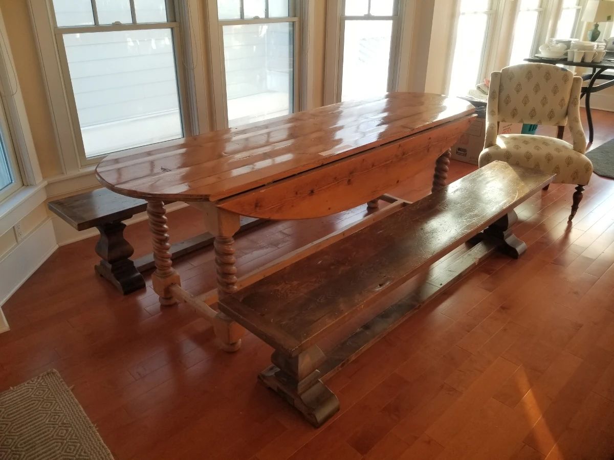 Rustic drop leaf table is 90" long. Benches are for sale but do not match table