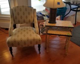 Upholstered arm chair; nesting tables
