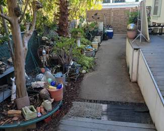 Yard art, plants, pots all for sale.