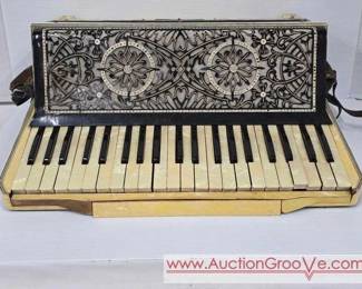 1 1930s Wurlitzer Phil Baker Accordion