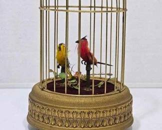 Automated Birdcage. The Yellow One Does Not Work and the Red Only Has Motion