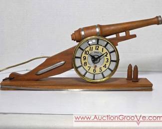 1 1945 Howard Electric Clock. Artillery Cannon.
