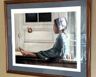 Framed print of Amish girl.