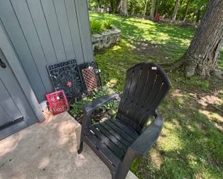 Plastic chair and metal grates.