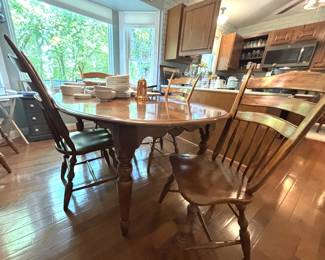 BUY IT NOW! $295.00. Table w/six chairs and two 15" leaves. 56 1/2" L x 46" W. (80 1/2" L w/both leaves). Call Jan at 314 960-5700.