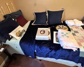 Single bed and quilts.