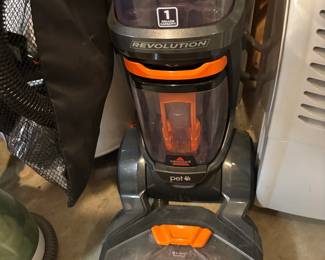 Bissell proheat 2X revolution pet pro carpet stain deep cleaner.